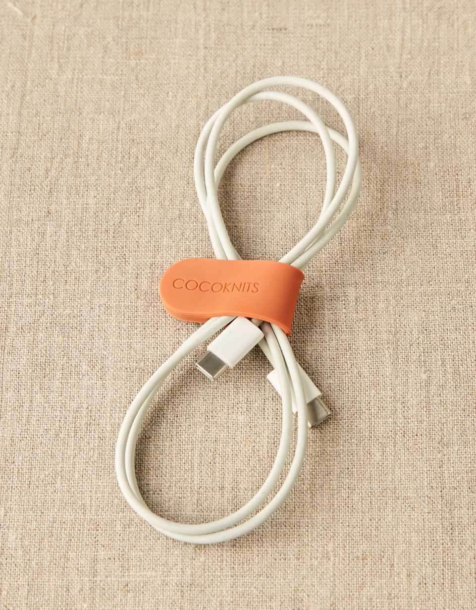 Cocoknits Maker's Clips earthtones holding electronics cord