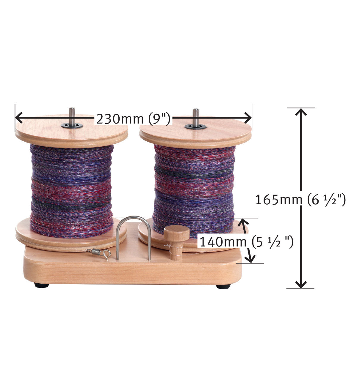 Ashford E-spinner electric spinning wheel tensioned lazy kate specifications image. The tensioned lazy kate is 6.5 inches tall with bobbins on it, and 5.5 inches wide by 9 inches long.